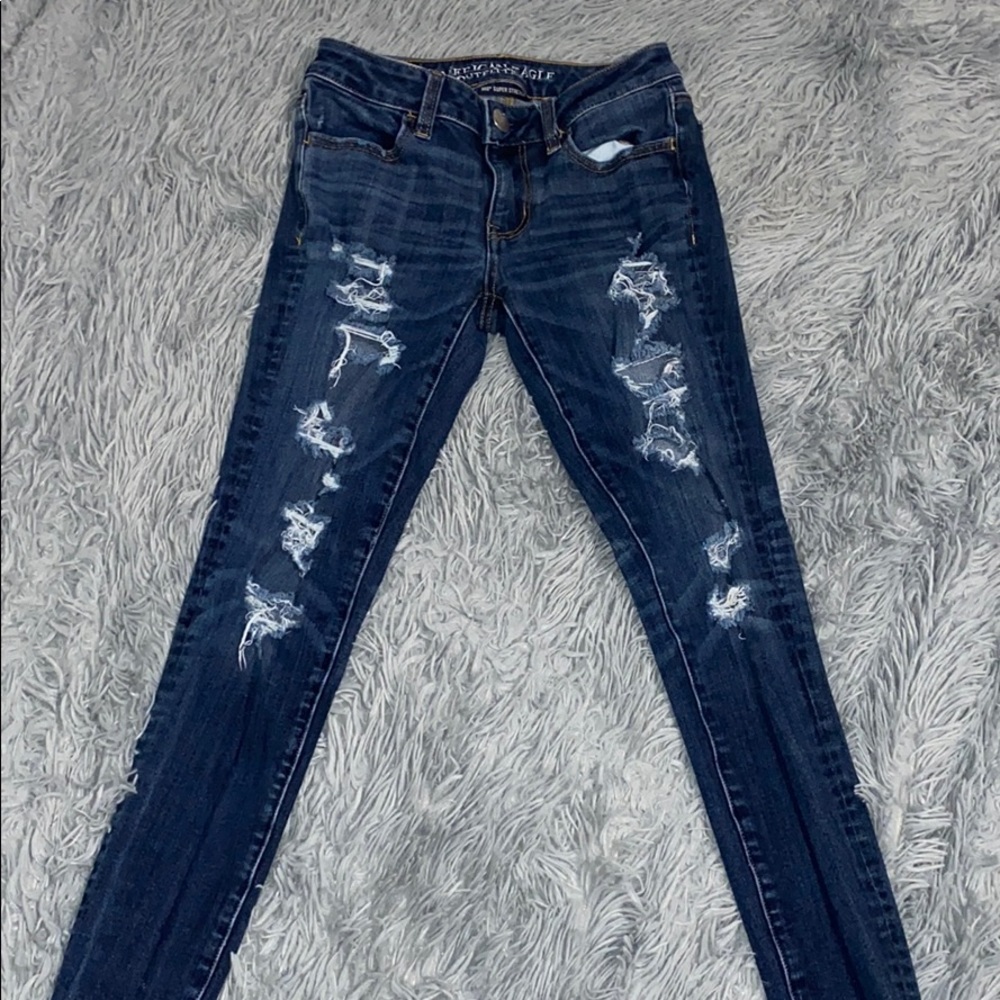 Dark washed ripped American eagle jeans